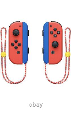 Interrupteur Nintendo Mario Red & Blue Édition. Édition Limitée Spéciale. Nouveauté